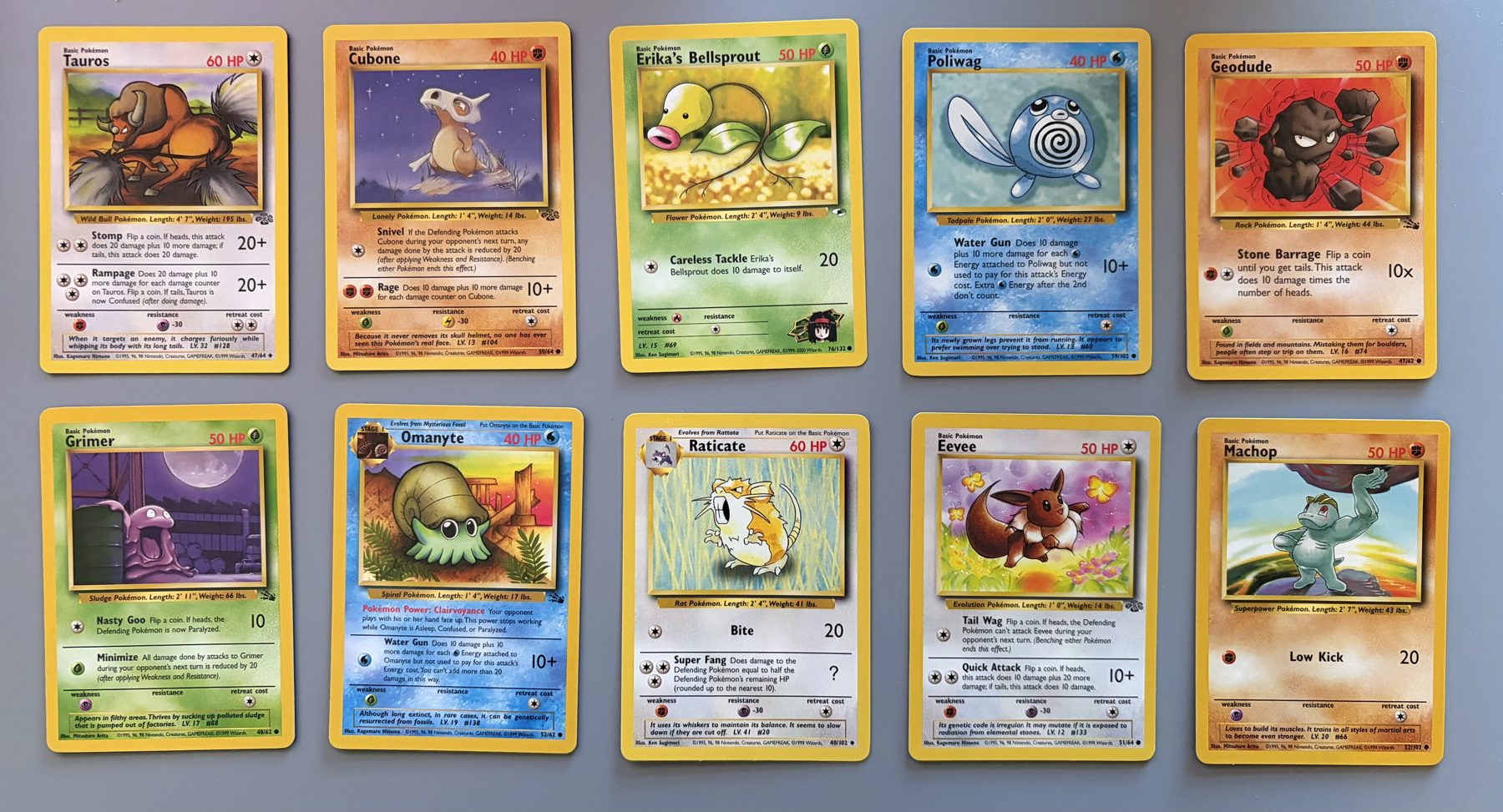 Vintage WOTC Pokémon 10-Card Lot – Eevee, Omanyte, Tauros, front