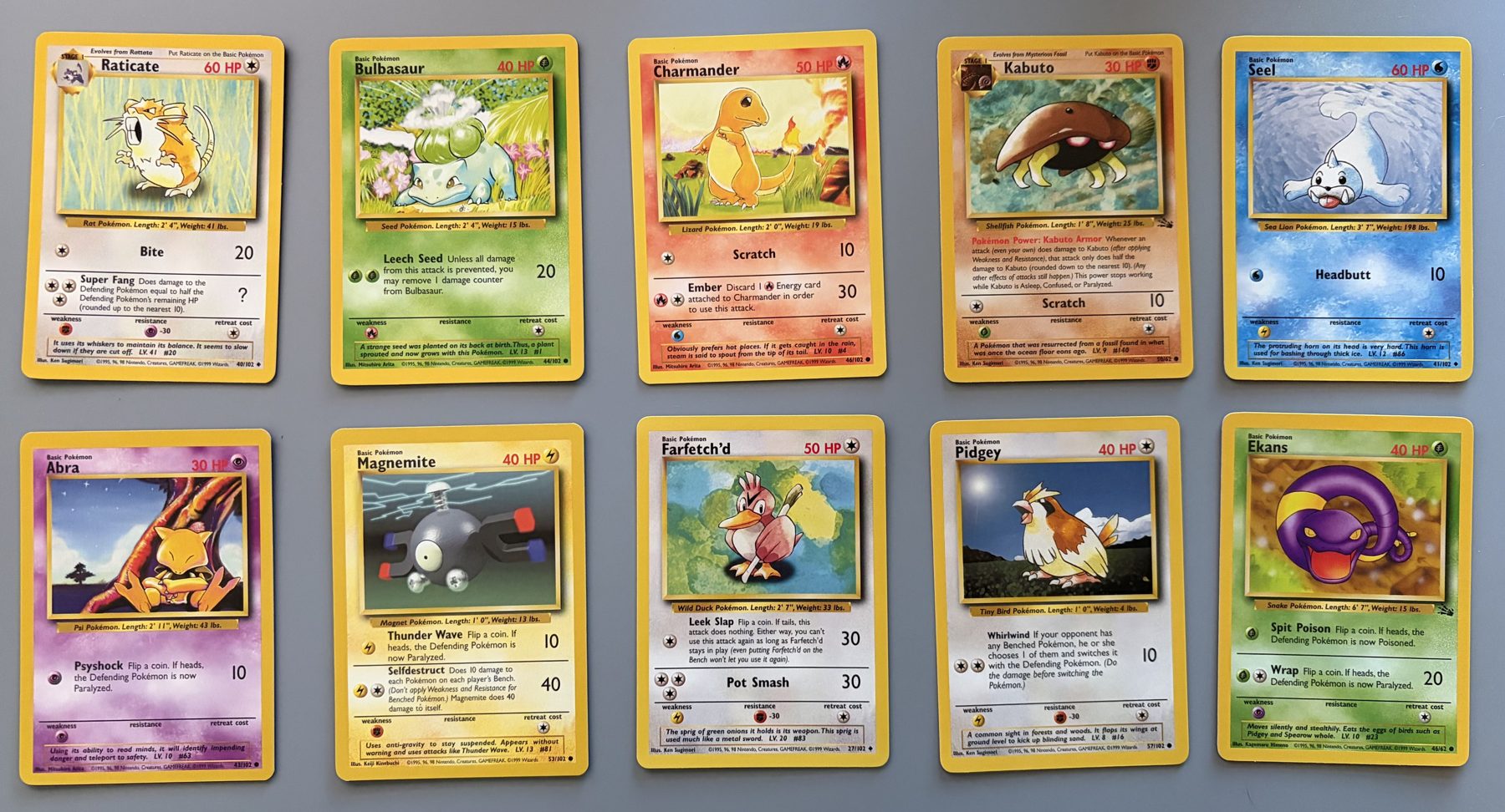 Vintage WOTC Pokémon 10-Card Lot – Charmander, Bulbasaur, Kabuto, front