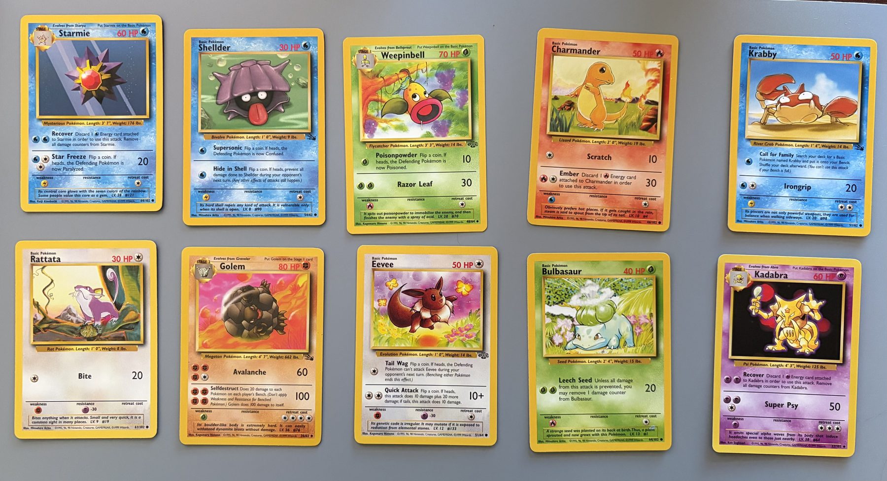 Vintage WOTC Pokémon 10-Card Lot – Charmander, Eevee, Kadabra, front