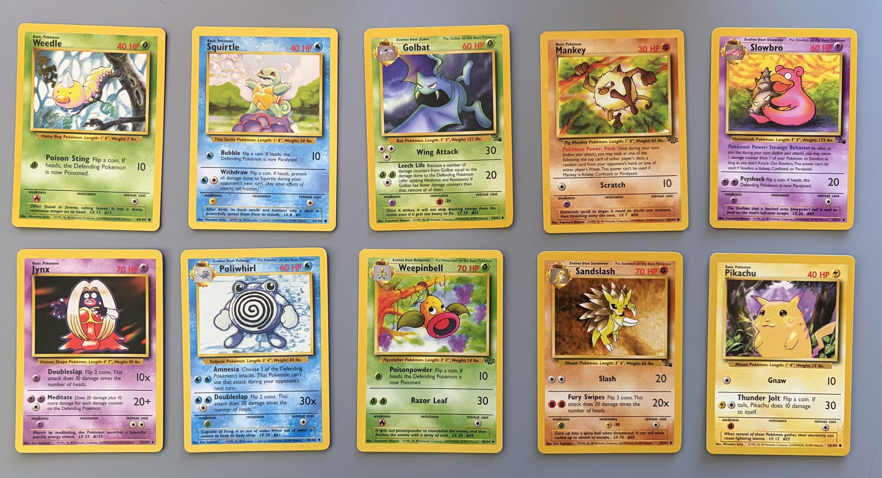 Vintage WOTC Pokémon 10-Card Lot – Squirtle, Pikachu, Slowbro, front