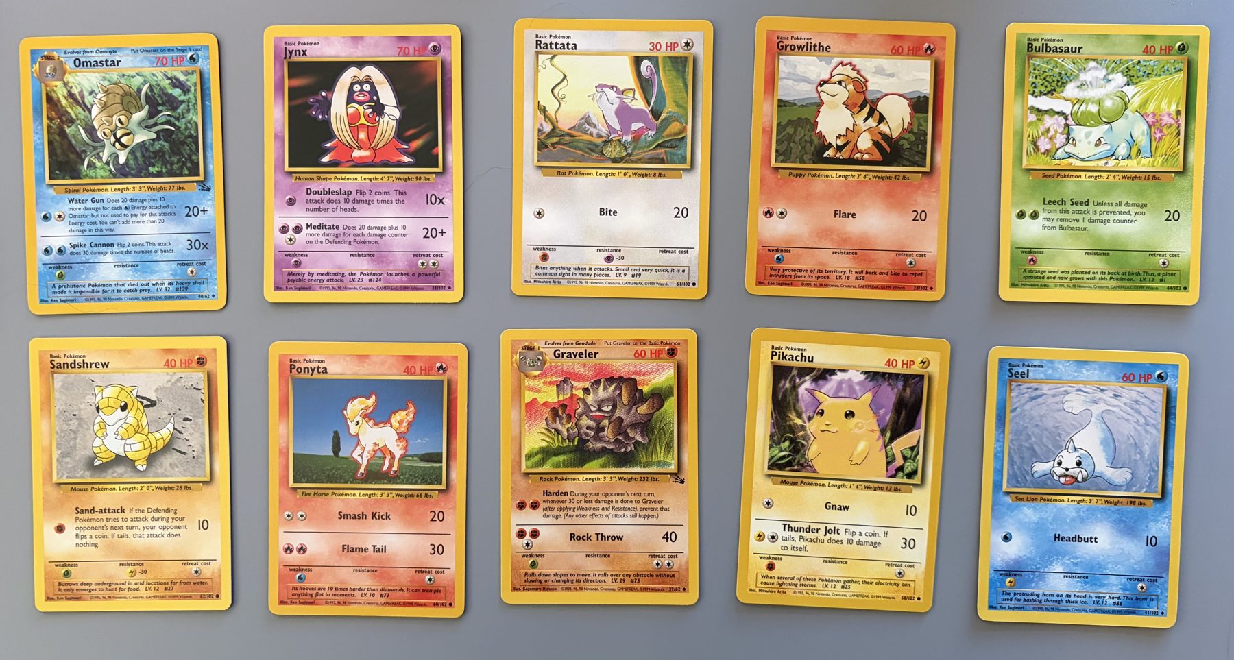 Vintage WOTC Pokémon 10-Card Lot – Pikachu, Omastar, Ponyta, front